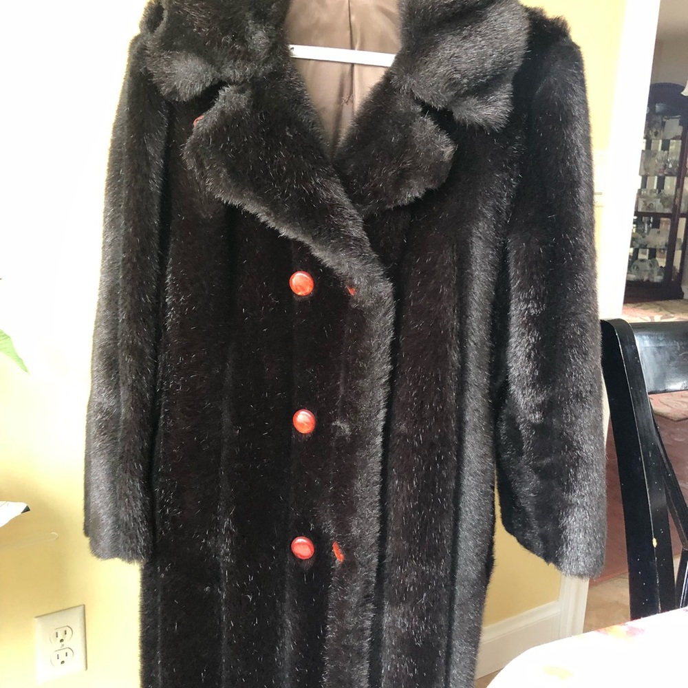 Faux fur long coat, gently used. One button missing…best offer.